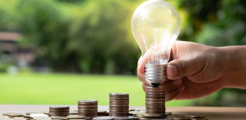 business-accounting-with-saving-money-with-hand-ho-BUXJY7T